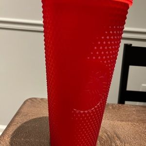 Red studded cup